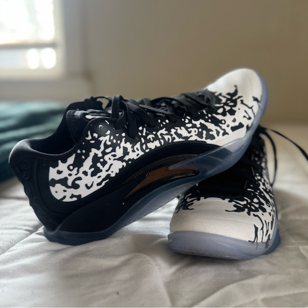 Men’s Jordans Black and White Athletic Basketball shoes with Bold Design